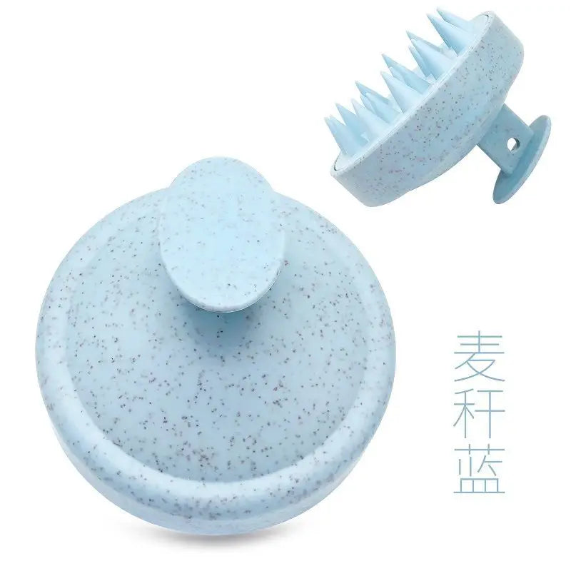 Silicone scalp massage brush comb in a blue color, designed for head massages and hair care.